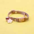Collier en velours côtelé avec fleur et clochette